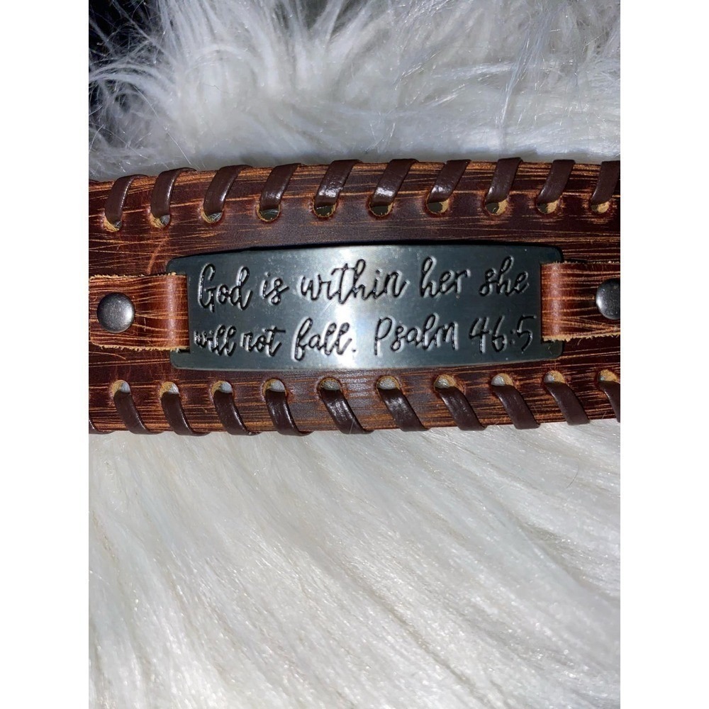Leather wrist band Engraved verse. 'God is with her she will not fall.'Psalm46:5